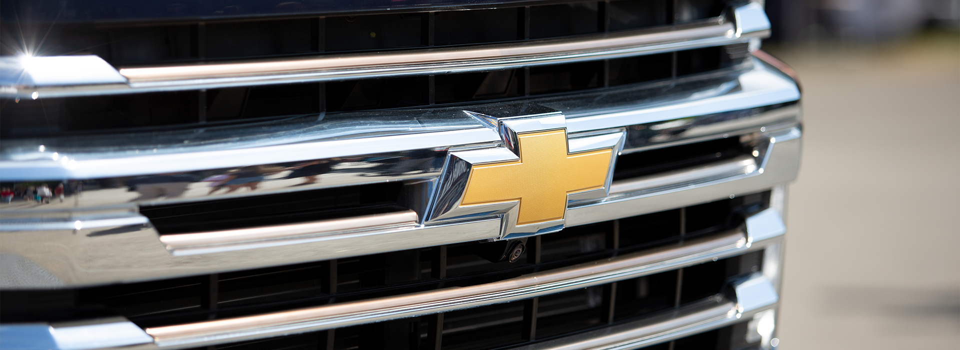 Chevrolet logo on the front of a truck