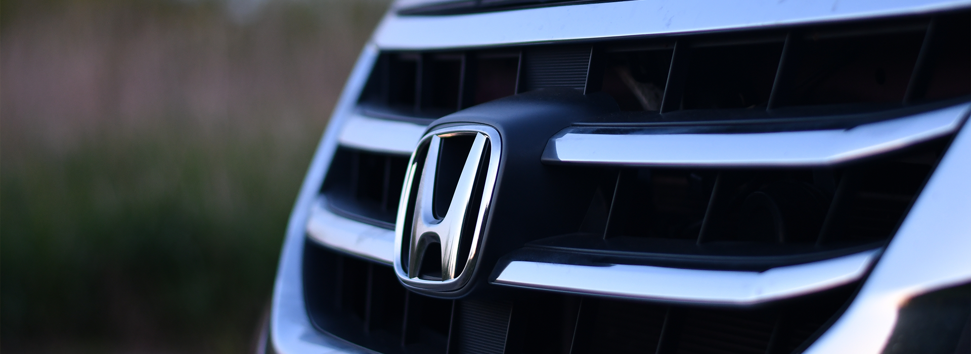 Honda logo on the front of a car